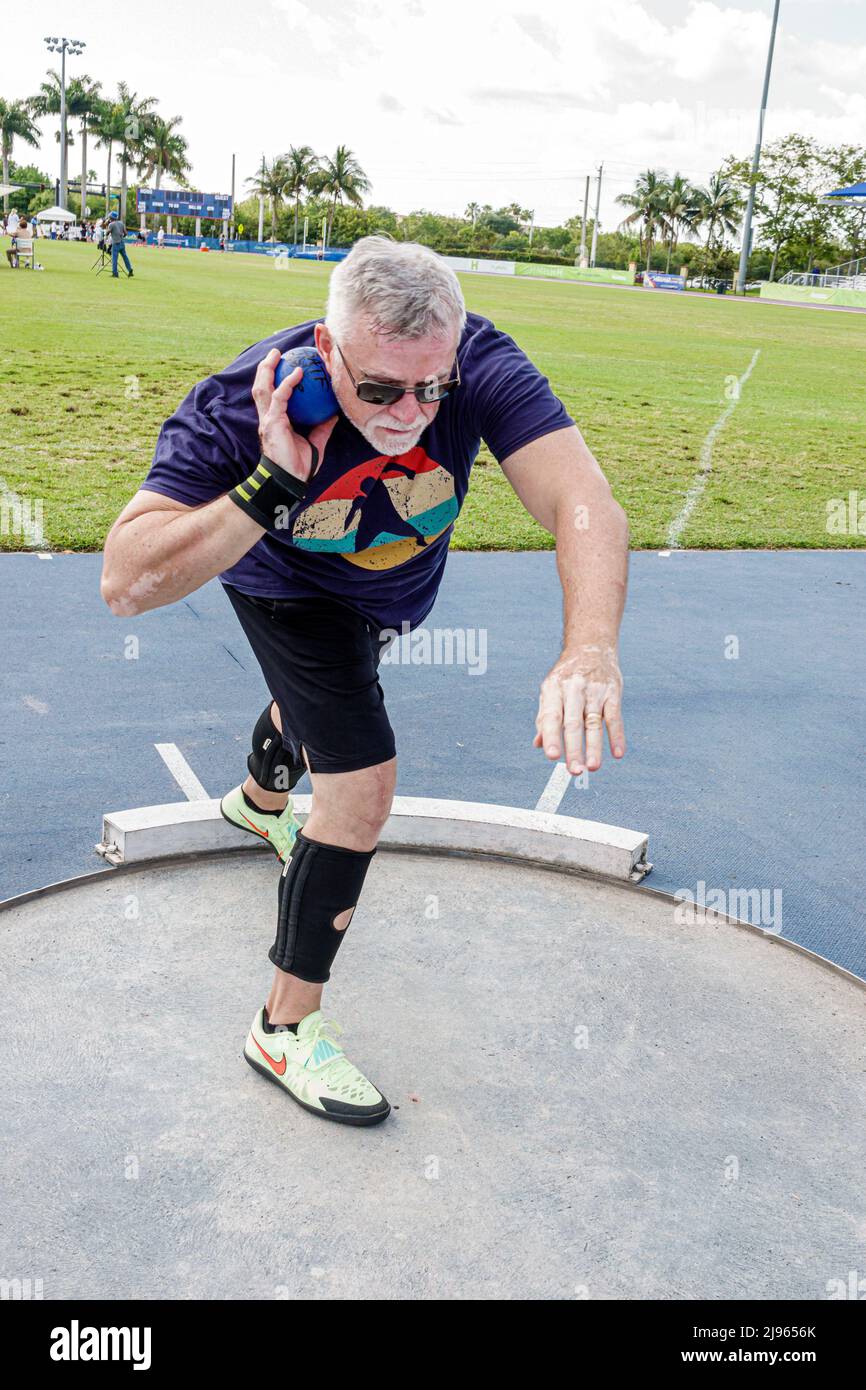 Fort Ft. Lauderdale Florida,Ansin Sports Complex Track & Field National Senior Games,male man competitor competing throwing shot put Stock Photo