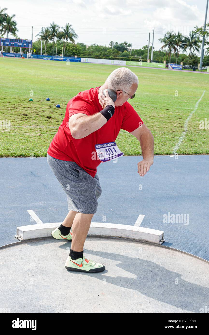 Fort Ft. Lauderdale Florida,Ansin Sports Complex Track & Field National Senior Games,male man competitor competing throwing shot put Stock Photo