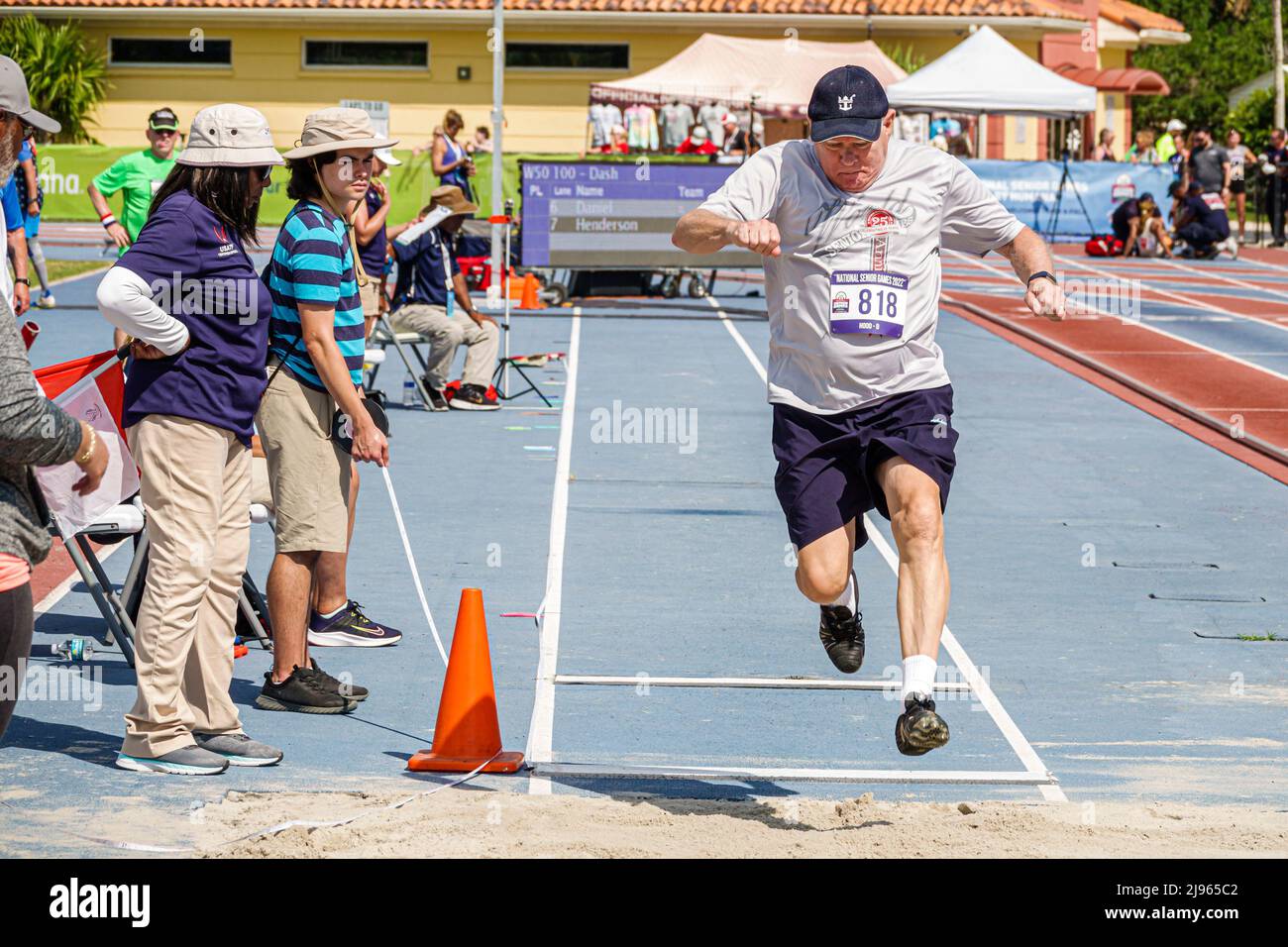 Fort Ft. Lauderdale Florida,Ansin Sports Complex Track & Field National Senior Games,man male long jump competition competitor jumping Stock Photo