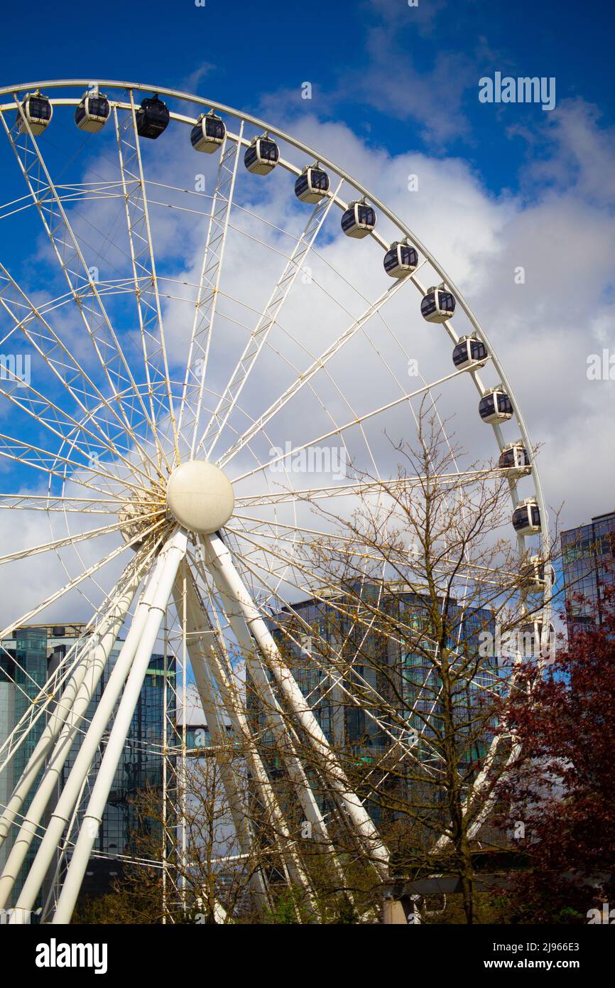 Göteborg, Sweden – 7 April 2022: Liseberg amusement park, ferry wheel against the sky with clouds Stock Photo