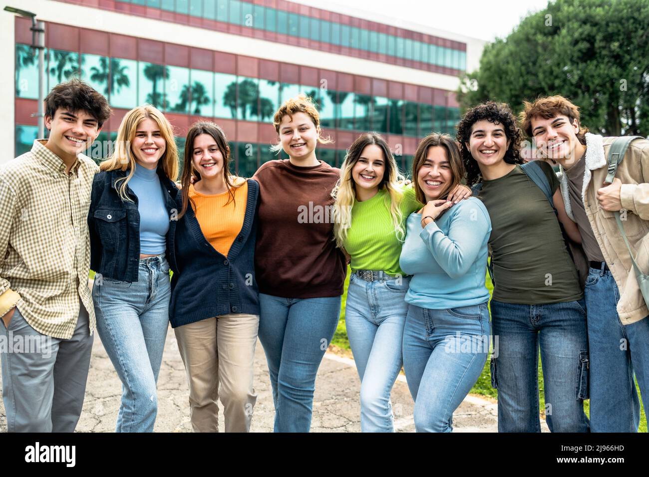 Happy group of teenagers having fun outside university - Young students people lifestyle concept Stock Photo