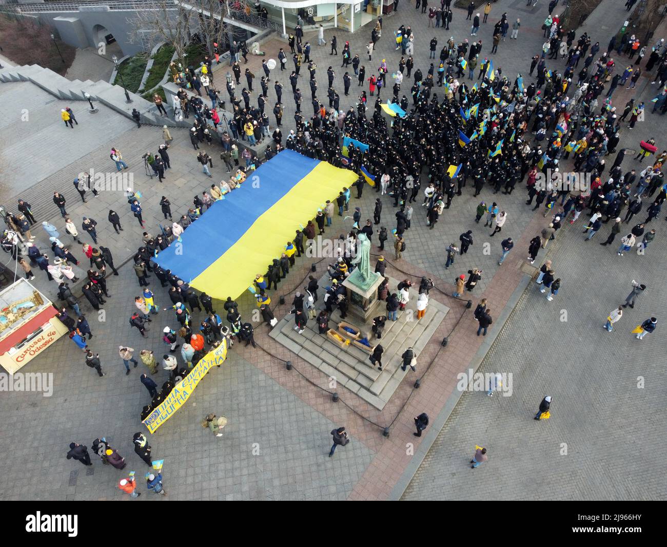 EDITOR'S NOTE: Image taken with a drone)Aerial view of flash mob with  umbrellas in the colors of the national flag of Ukraine near the monument  of Duc de Richelieu. The march was