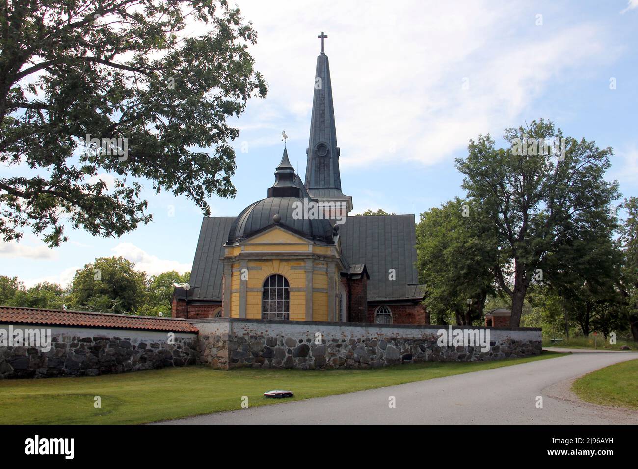 Parish Church, built around 1340, on the grounds of Angso (also Engso) Castle on the island on the Lake Malaren, Angso, Vastmanland, Sweden Stock Photo