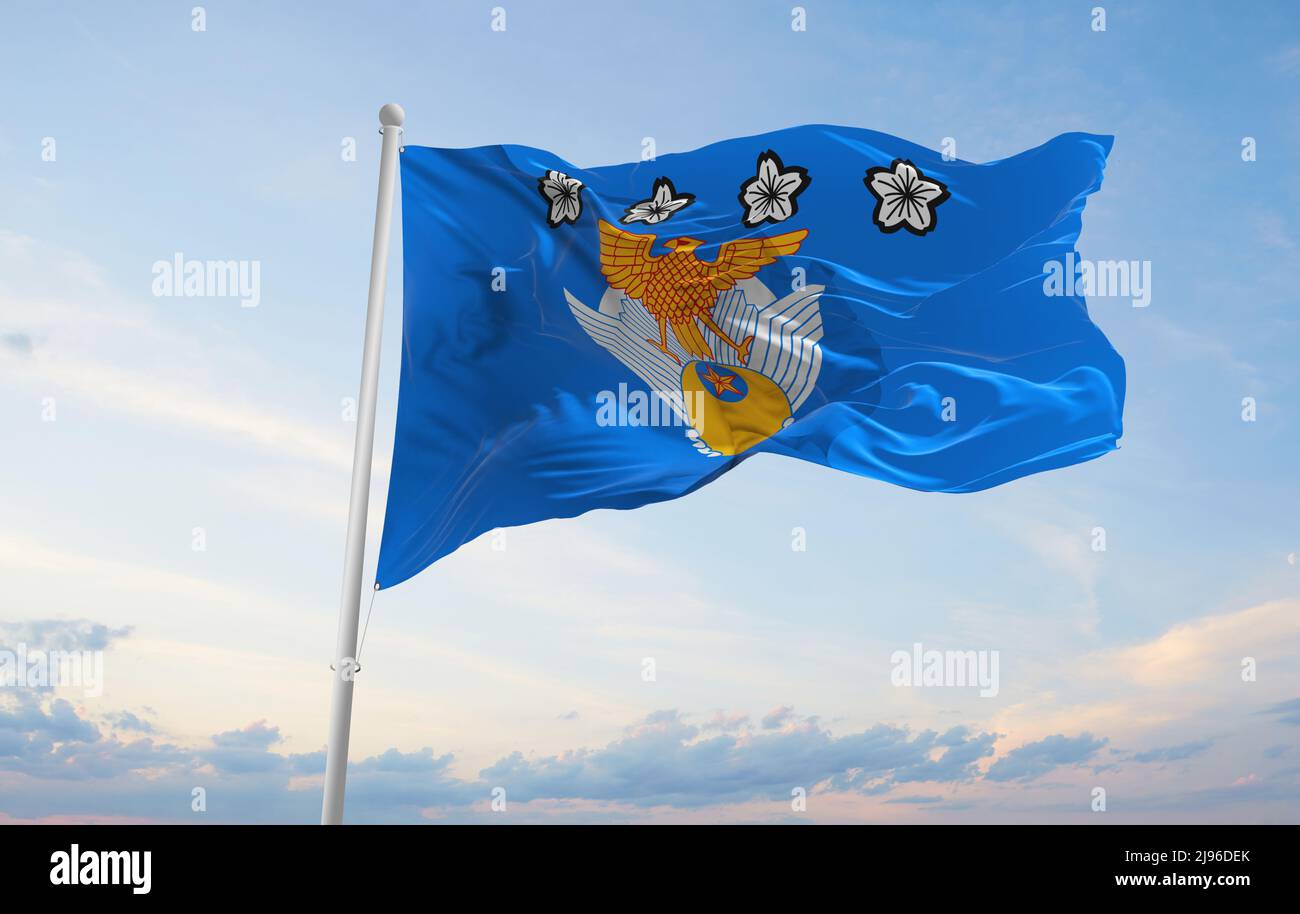 official flag of Chief of Staff of Air Self Defense Force , Japan at cloudy sky background on sunset, panoramic view. Japanese travel and patriot conc Stock Photo