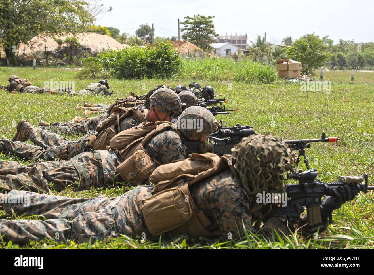 Belize Defense Force, Meixcan Marines, and US Marines conduct culminating exercises including vehicle takedown, search and seizure, arrest, riot control, and building raids May 19, 2022 at Belize Police Training Academy for Tradewinds 2022. Tradewinds 2022 is a multinational exercise designed to expand the Caribbean region’s capability to mitigate, plan for, and respond to crises; increase regional training capacity and interoperability; develop new and refine existing standard operating procedures (SOPs); enhance ability to defend exclusive economic zones (EEZ); and promote human rights and a Stock Photo