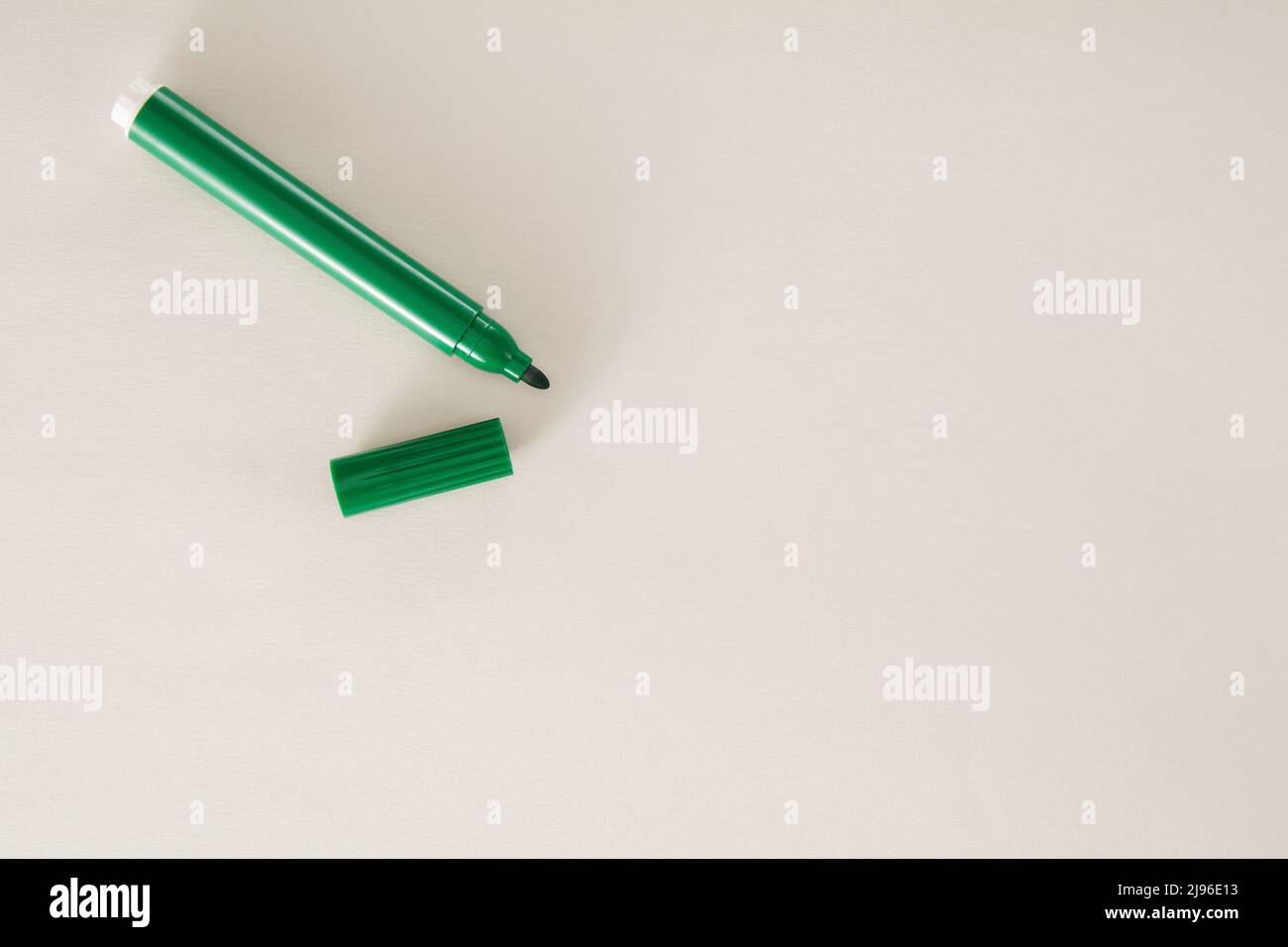 Green felt tip pen on white background Stock Photo - Alamy
