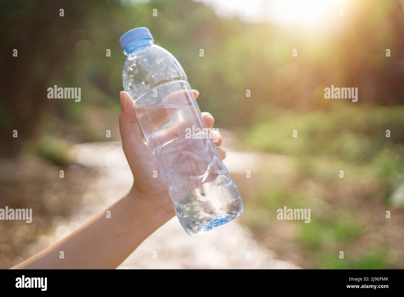 women hand holding plastic bottle Stock Photo Alamy