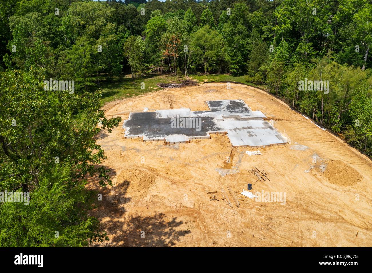 New Home construction site with concrete foundation Stock Photo