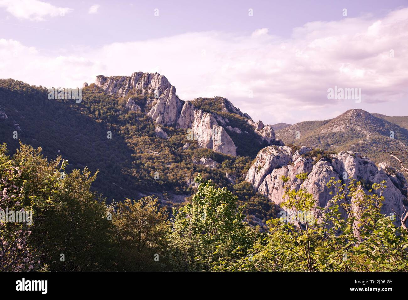 Scenic view of rocks and mountains during sunset Stock Photo