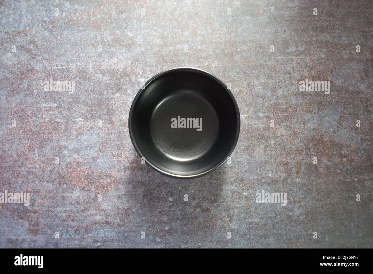 Black color empty round ceramic bowl Stock Photo