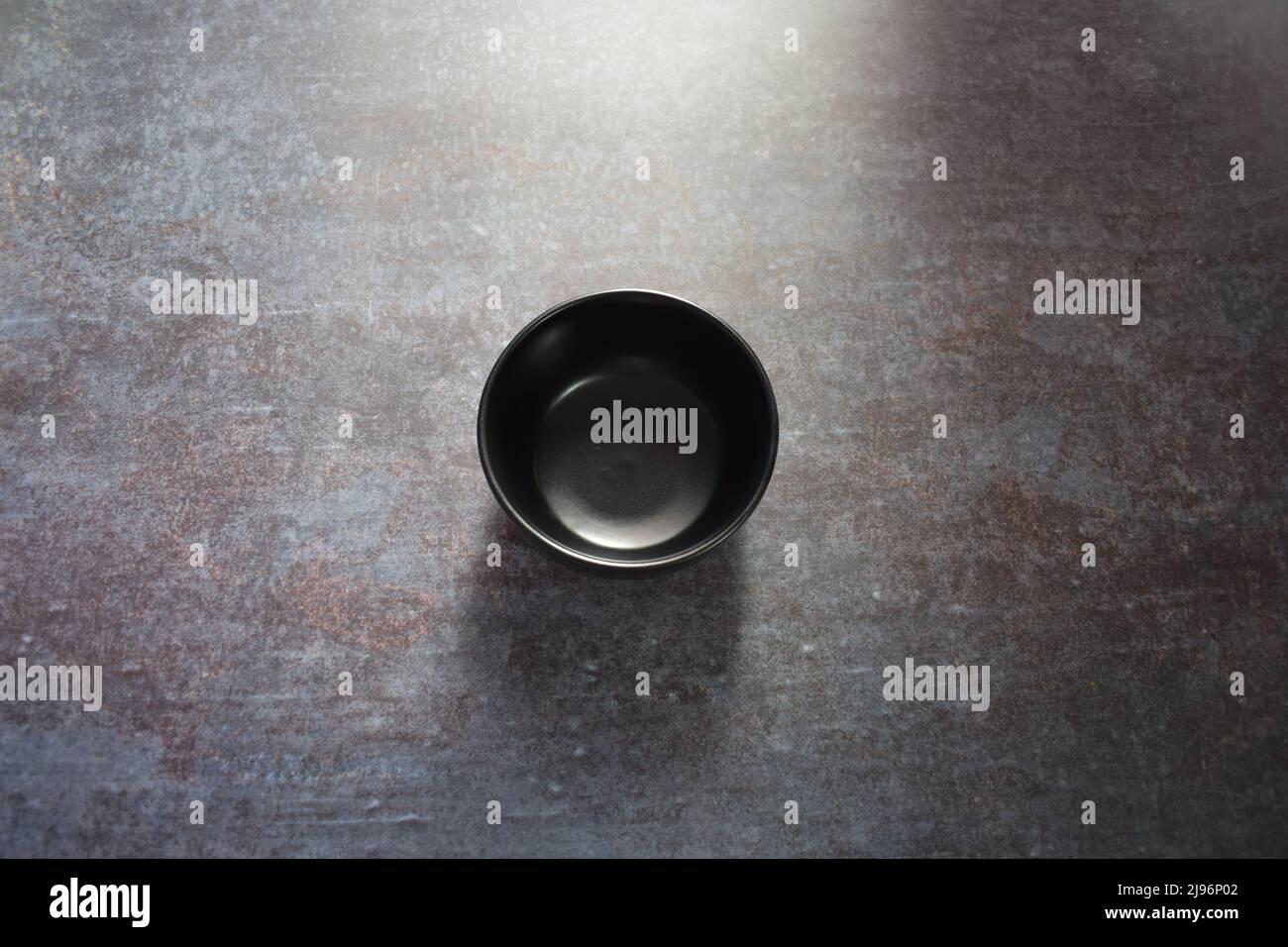 Black color empty round ceramic bowl Stock Photo