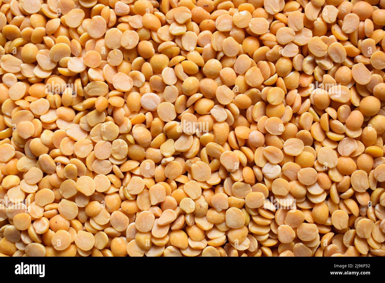 Yellow color raw dried split Pigeon pea lentils Stock Photo Alamy