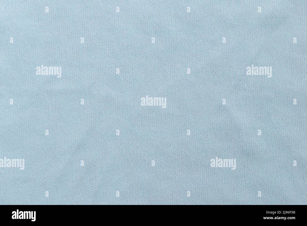 Light blue color microfiber eyeglasses cleaning cloth textured background Stock Photo