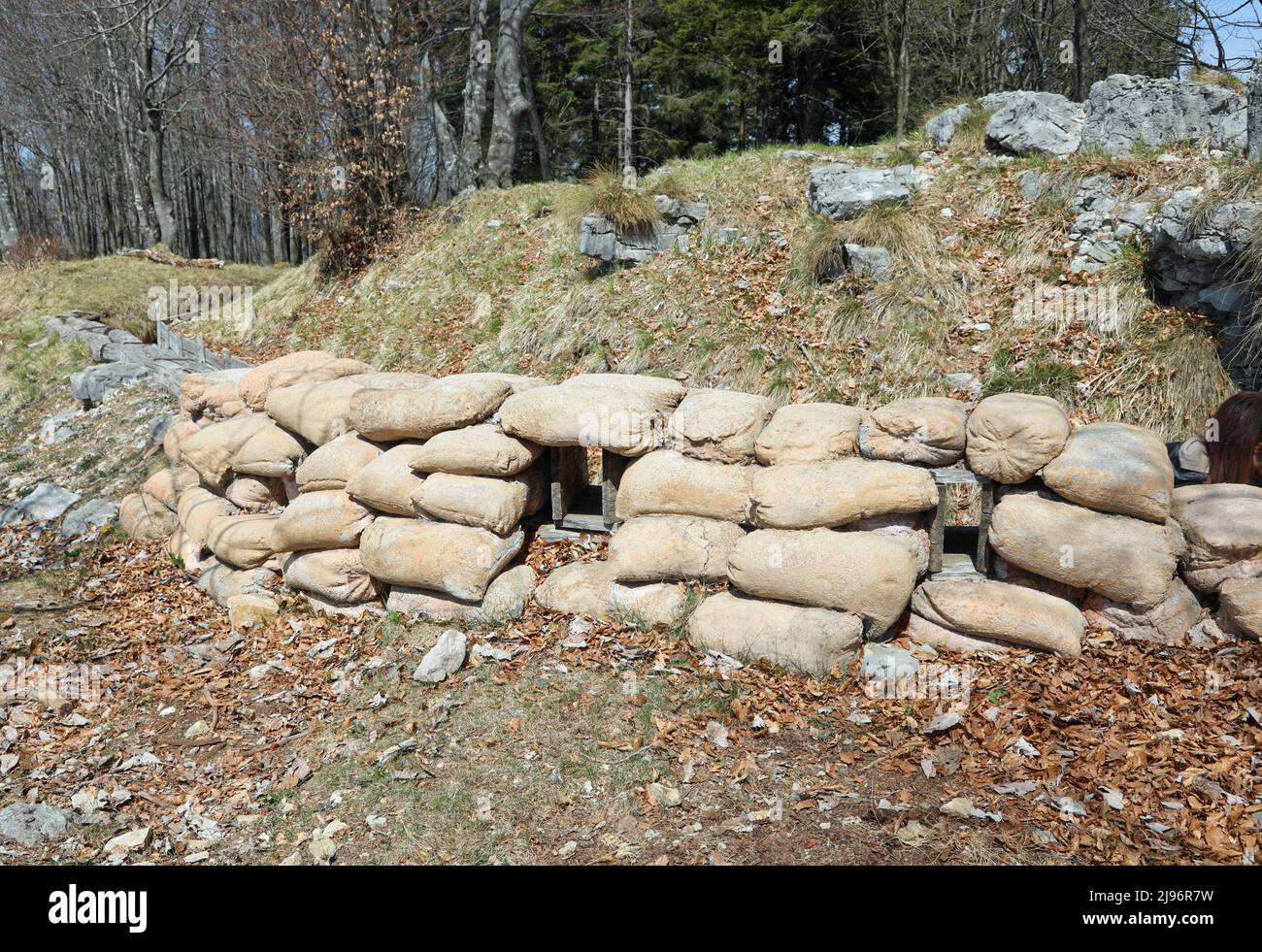many sandbags of the trench dug into the rock for the protection of