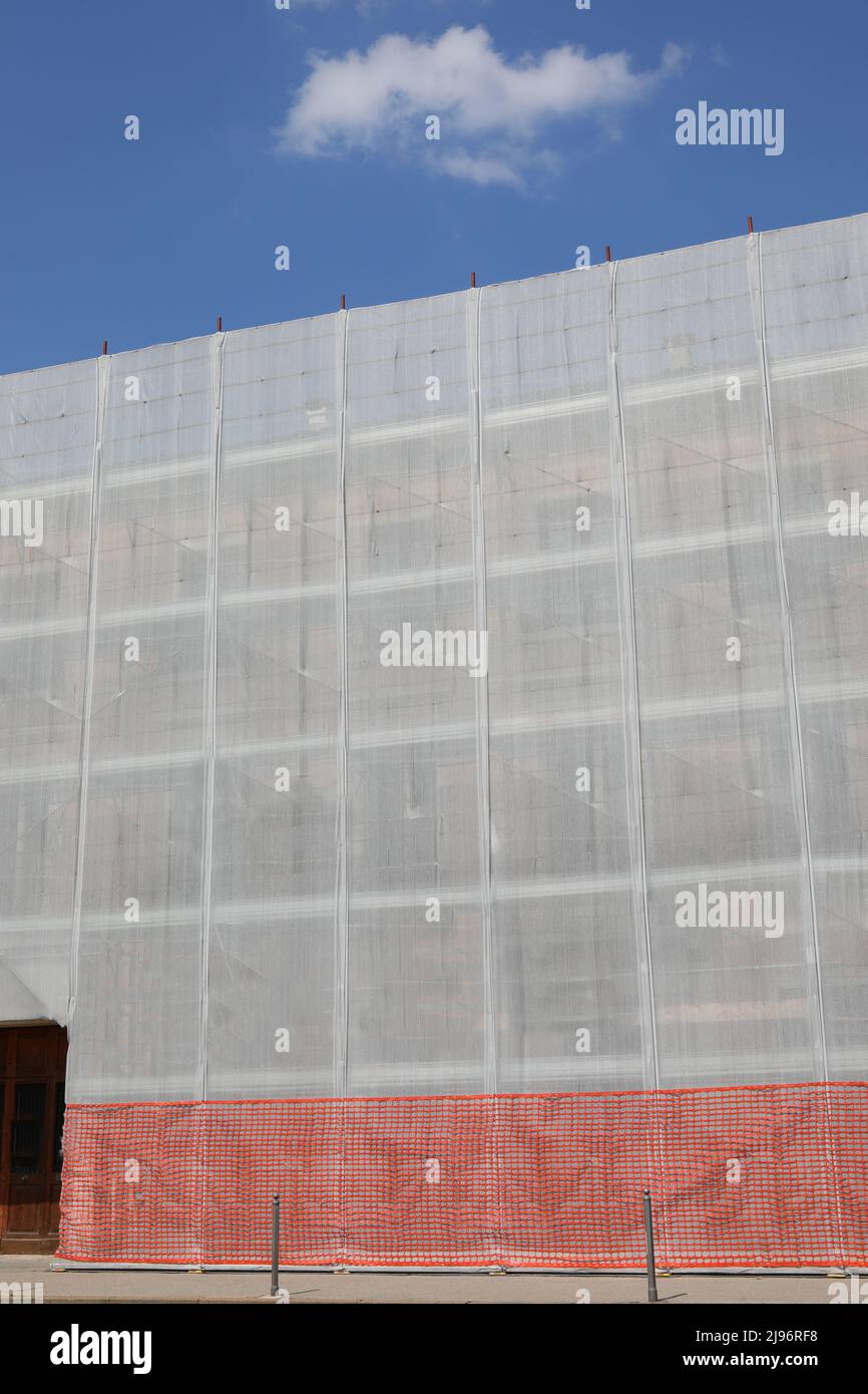 scaffolding of the house during the building renovation works paid for with tax incentives from the state Stock Photo