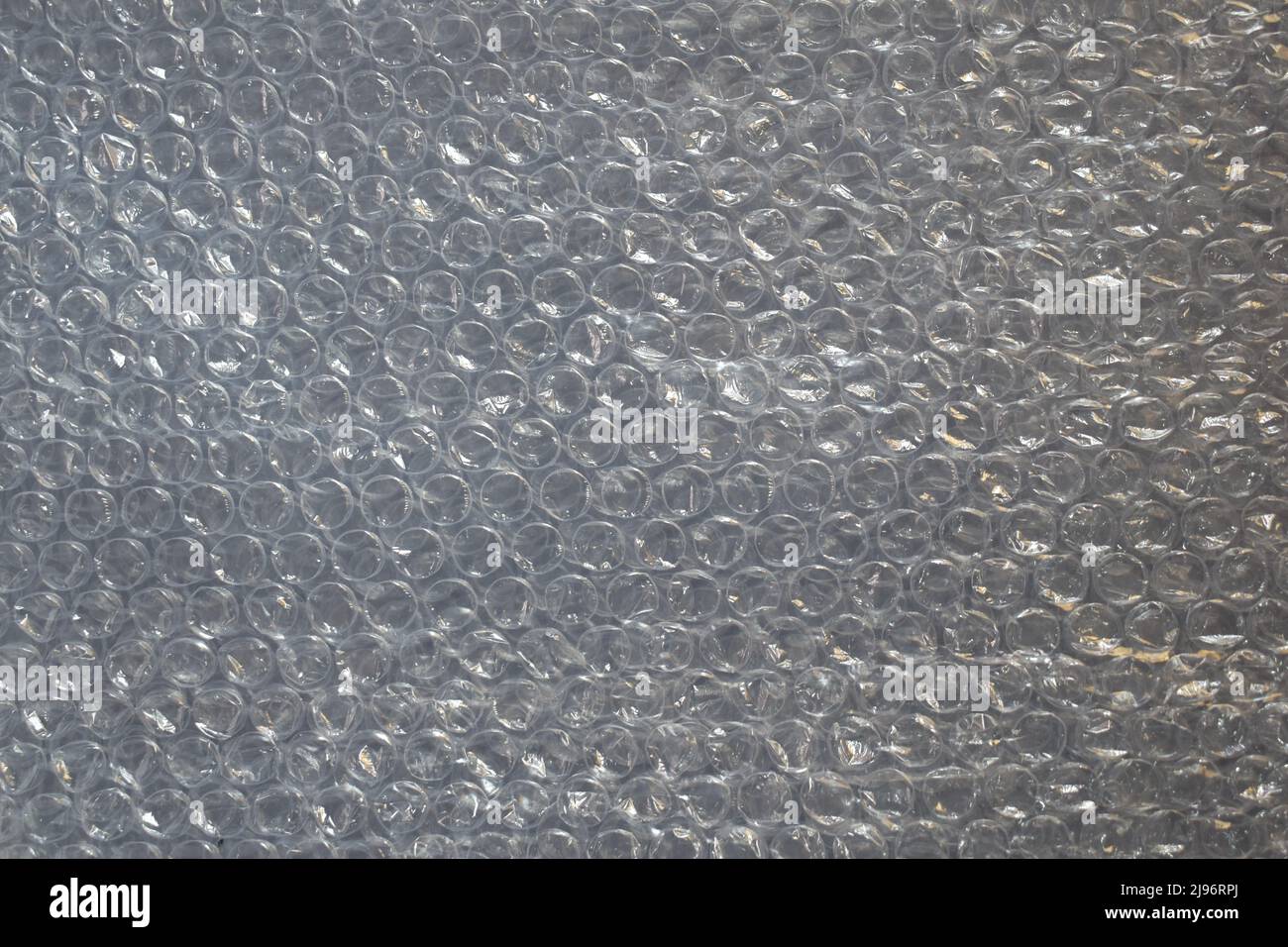 Translucent plastic air bubble packing background Stock Photo