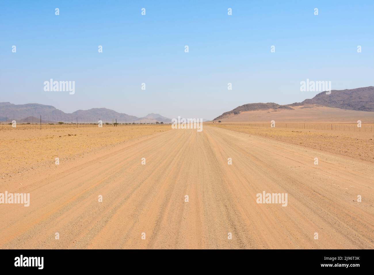 Landscape view of the endless horizons of the Tsaris Pass (on the C19 road through the Tsaris Mountains) in the Namib Desert, Namibia, Southern Africa Stock Photo