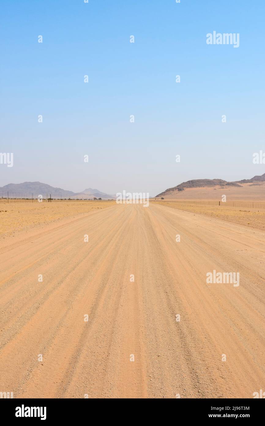 Landscape view of the endless horizons of the Tsaris Pass (on the C19 road through the Tsaris Mountains) in the Namib Desert, Namibia, Southern Africa Stock Photo