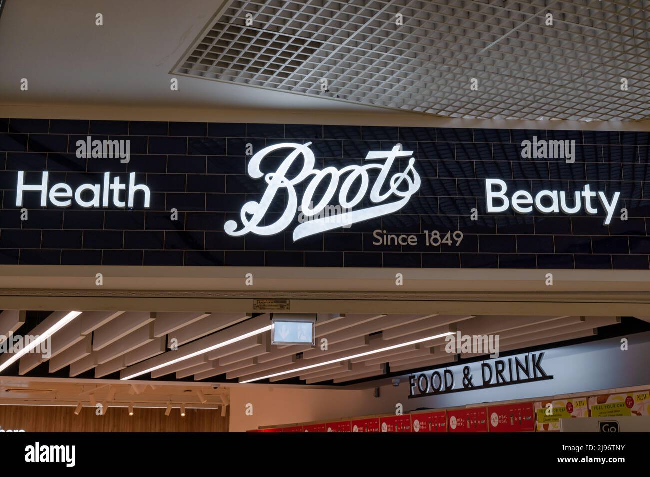 Belfast International Airport, North Ireland- May 3, 2022; The sign for Boots Chemist at Belfast International Airport Stock Photo