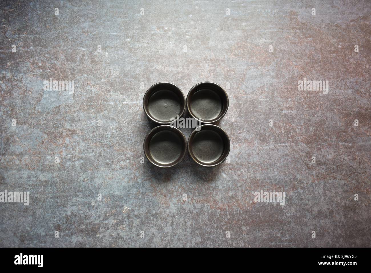 Black color empty round ceramic dip bowl Stock Photo