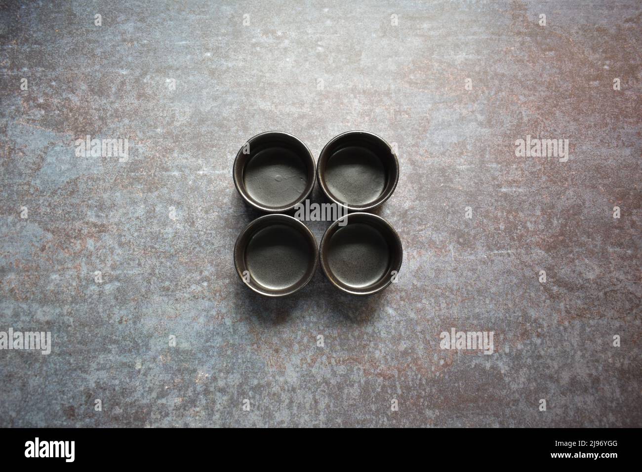 Black color empty round ceramic dip bowl Stock Photo
