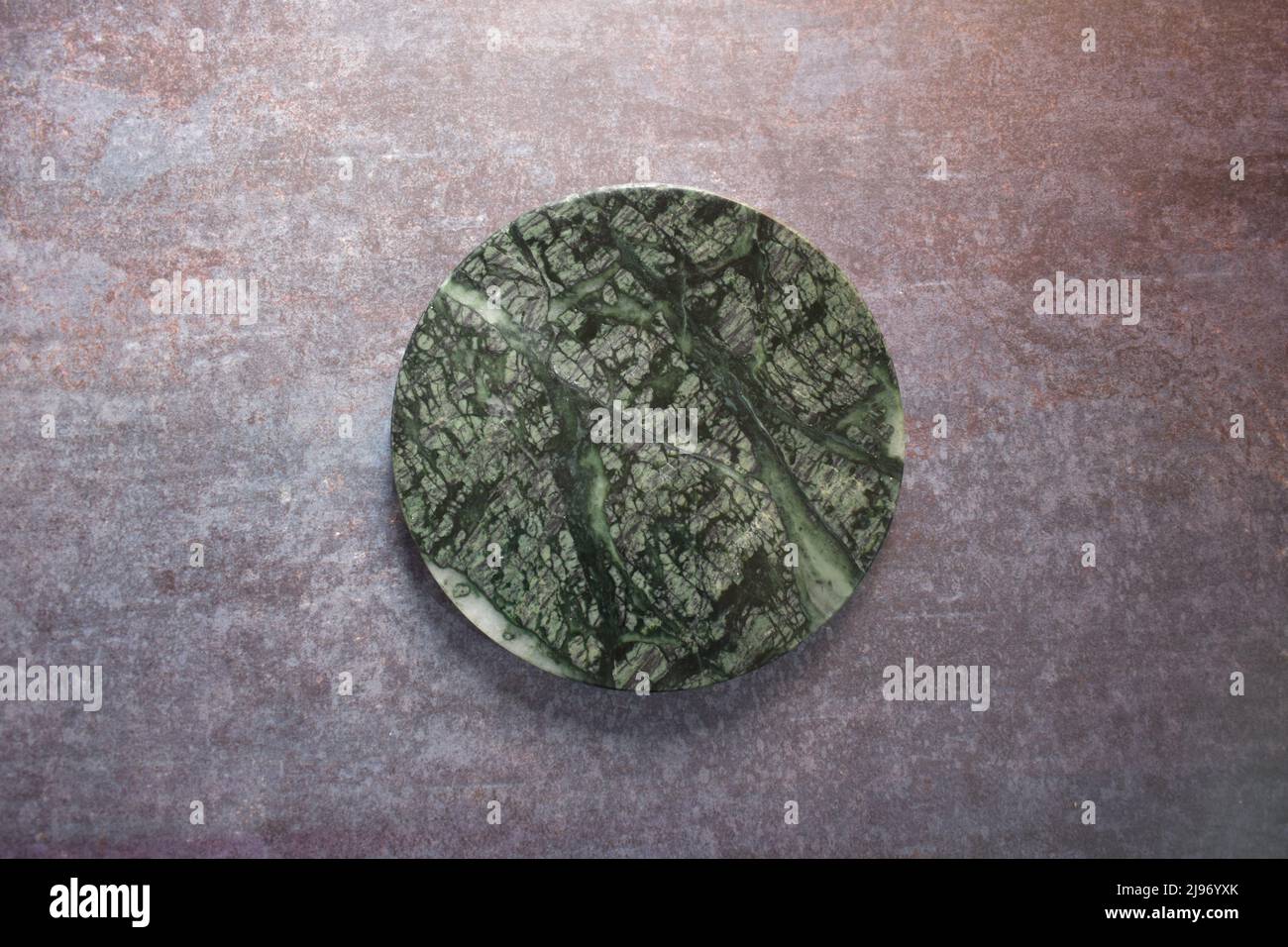 Green marble round rolling board Stock Photo