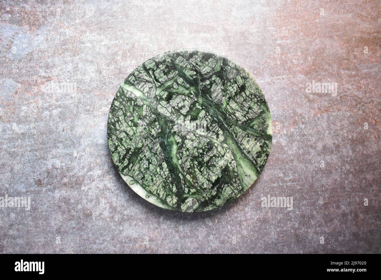Green marble round rolling board Stock Photo