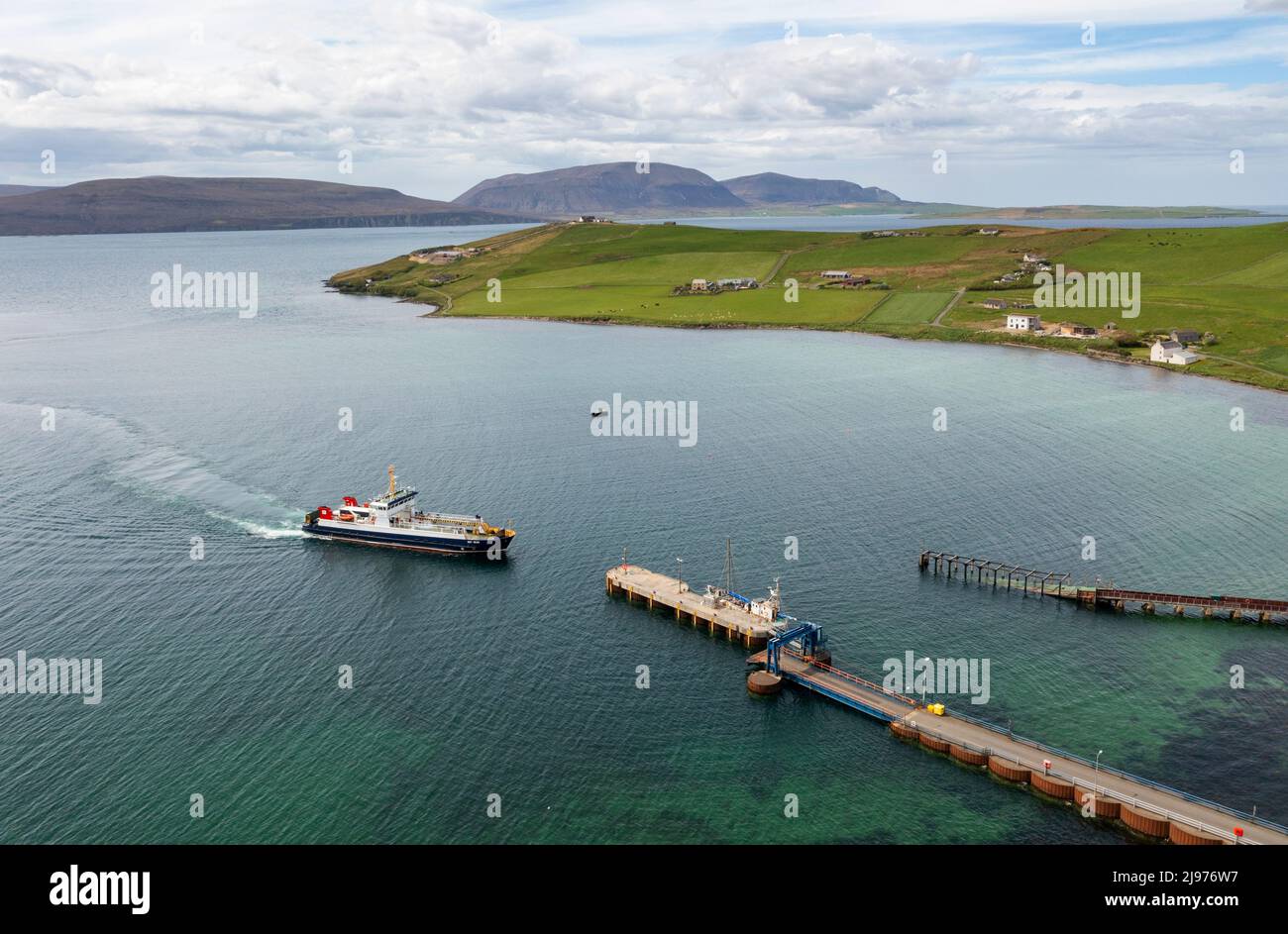 MV Hoy Head ferry arriving at Houton Pier, Orkney Mainland, The ferry links the mainland with the islands of Hoy, Flotta and South Walls. Stock Photo