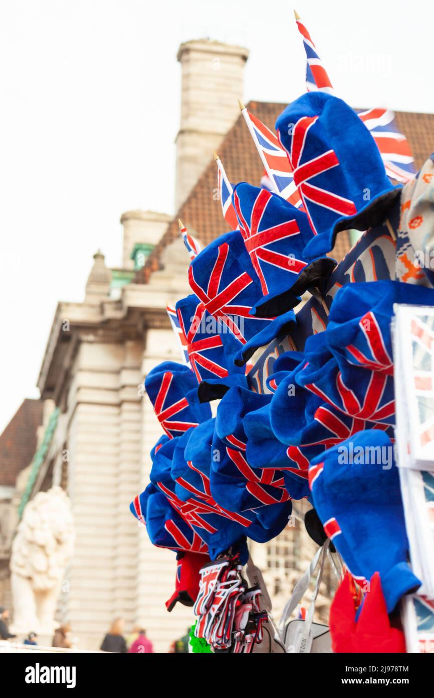Street souvenir stall with velvet Union Jack top hats for sale Stock Photo