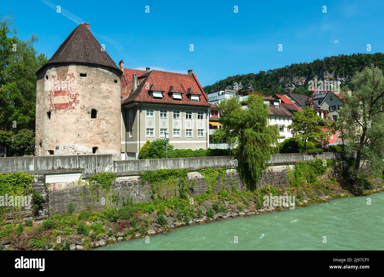 Feldkirch, Austria - May 20, 2022: View of the old town of Feldkirch with the water tower on the banks of the river Ill Stock Photo