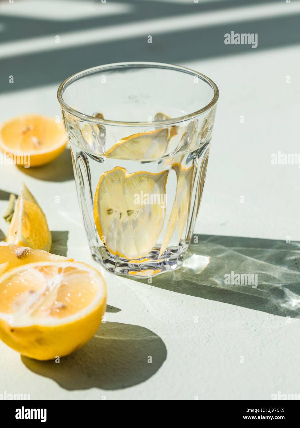 Gin tonic alcoholic cocktail drink with dry gin, bitter tonic, lemon