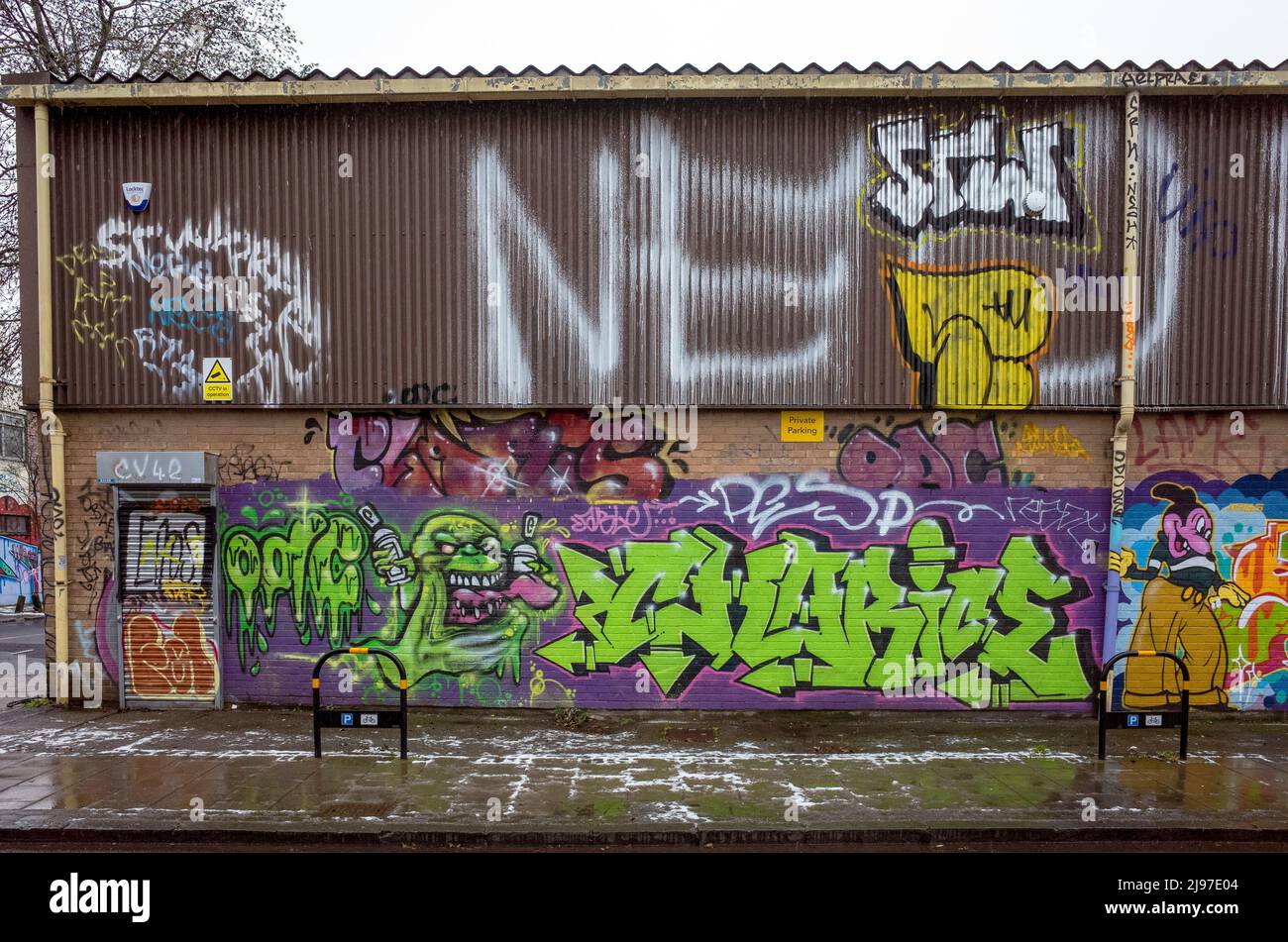 Ghostbusters Slimer Graffiti on a warehouse in Hackney Wick, East