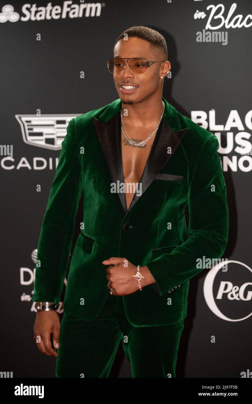 Singer / Songwriter Avery Wilson arrives on the Red Carpet of the 7th