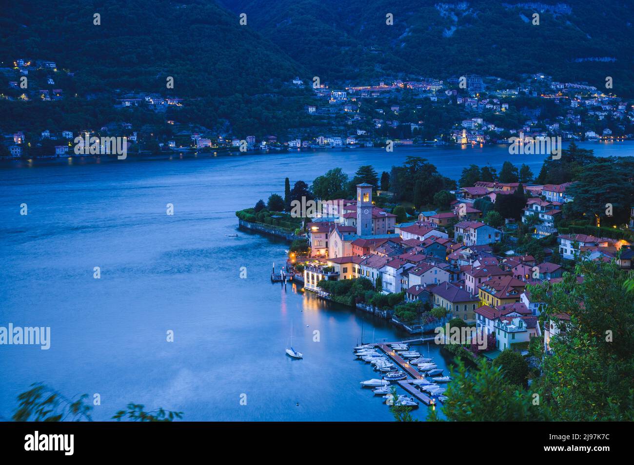 Panoramic top view of Lake Como during evening. Lombardy, Italy. The small town of Torno.  Stock Photo