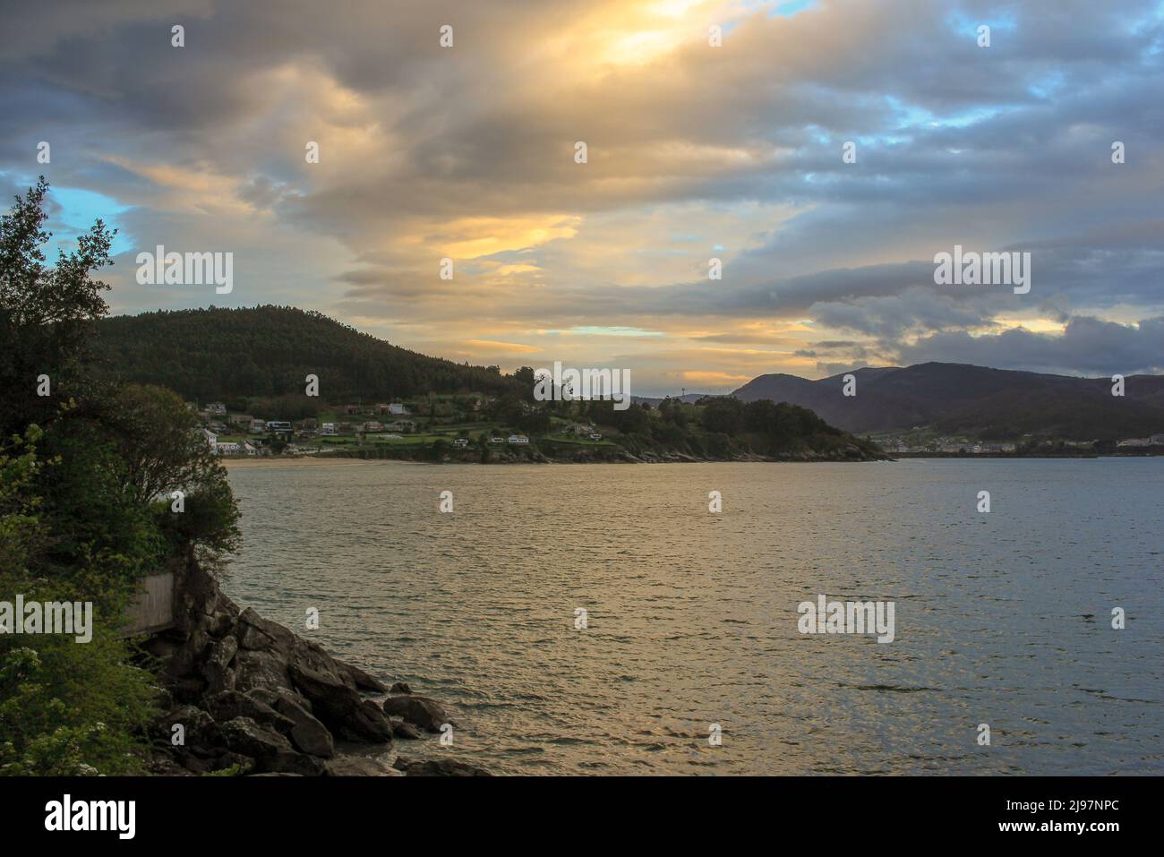 cloudy sunset over the sea Stock Photo - Alamy