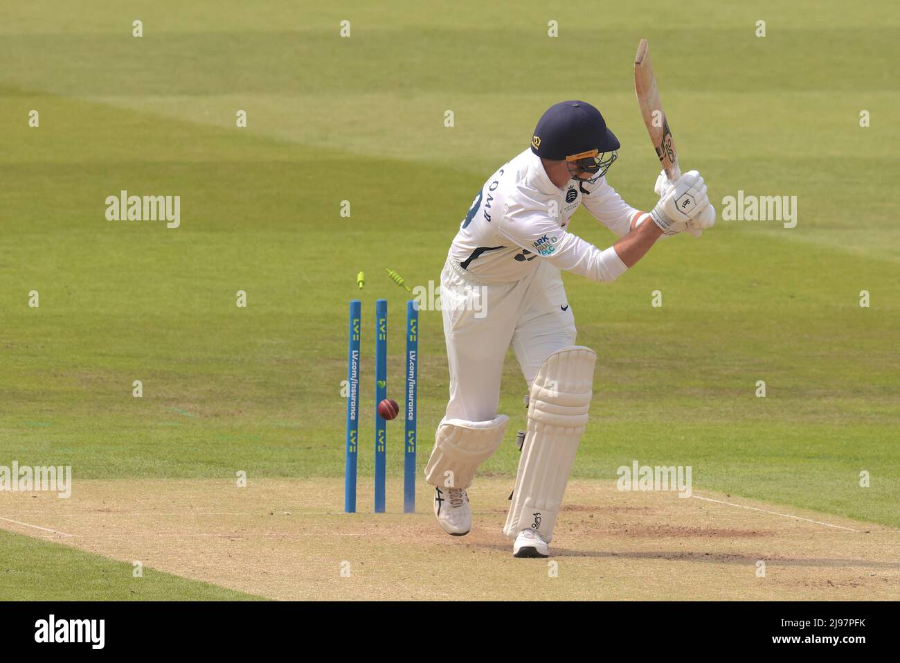 21 May, 2022. London, UK. Middlesex’s Peter Handscomb is bowled by Ben Raine as Middlesex take on Durham on day three of the County Championship match at Lords. David Rowe/Alamy Live News Stock Photo