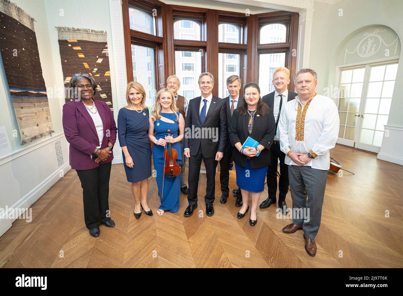 New York City, United States of America. 19 May, 2022. U.S. Secretary of State Antony Blinken, center, and U.N. Ambassador Linda Thomas-Greenfield, left, pose with artists and members during a visit to the Ukrainian Institute of America, May 19, 2022 in New York City, New York.  Credit: Freddie Everett/State Department/Alamy Live News Stock Photo