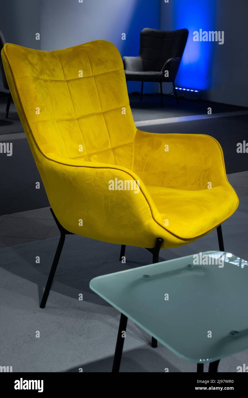 An empty meeting place during a pandemic. Colorful office chairs at the meeting place. Lack of people. Stock Photo