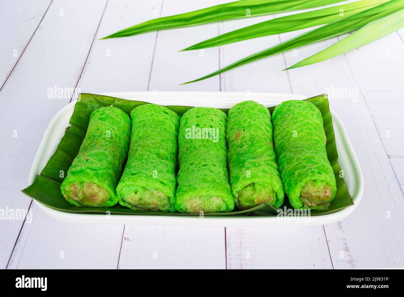 Malaysia popular assorted sweet dessert with coconut known as kuih ketayap. Stock Photo