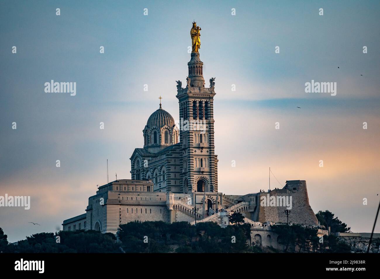 France. Marseille. Bouche-du-Rhone (13). Basilica Our Lady of the Guard at sunset Stock Photo