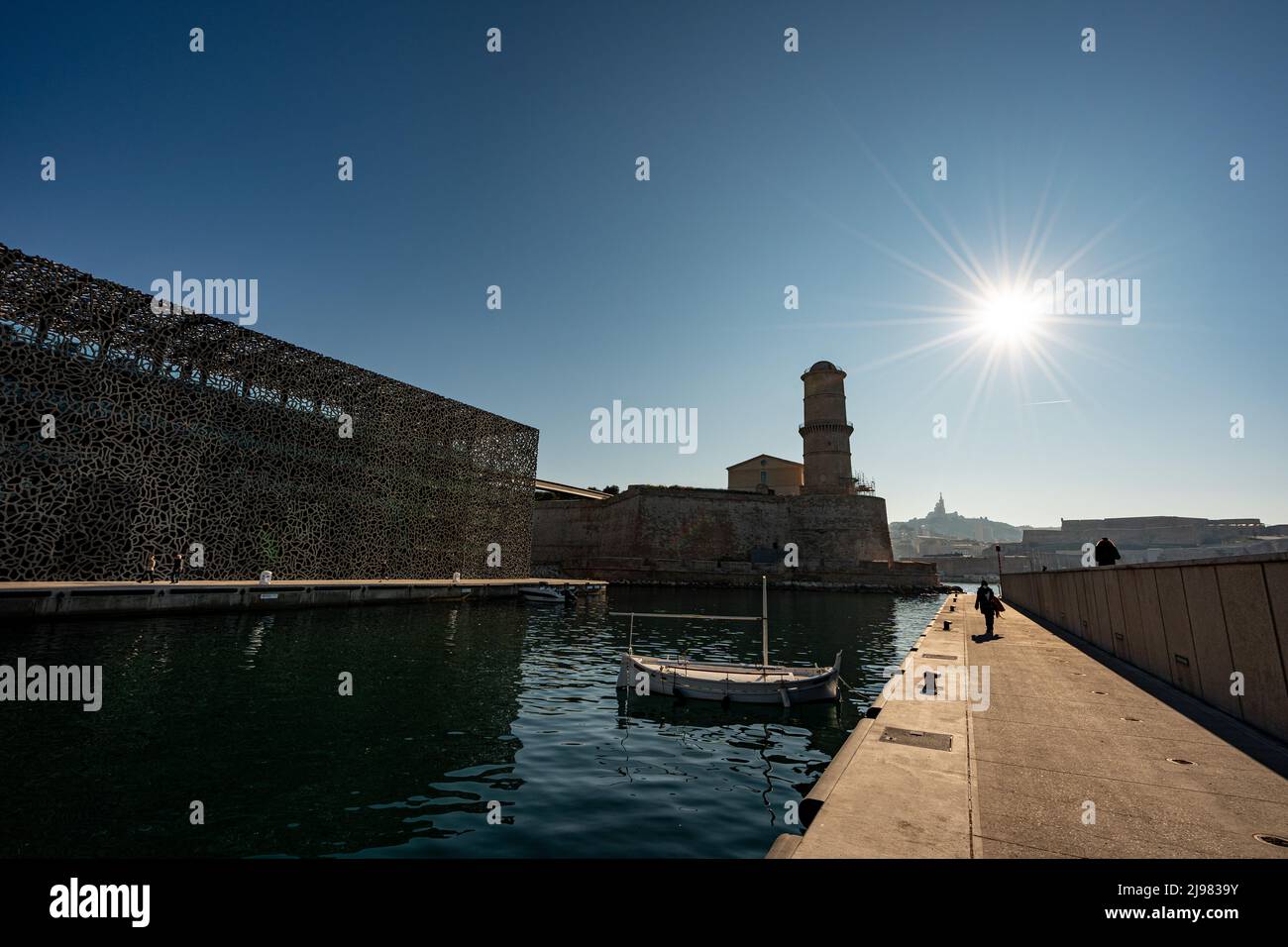 France. Marseille. Bouche-du-Rhône. The Mucem. People walking at Museum of European and Mediterranean Civilizations Fort Saint-Jean in the background Stock Photo