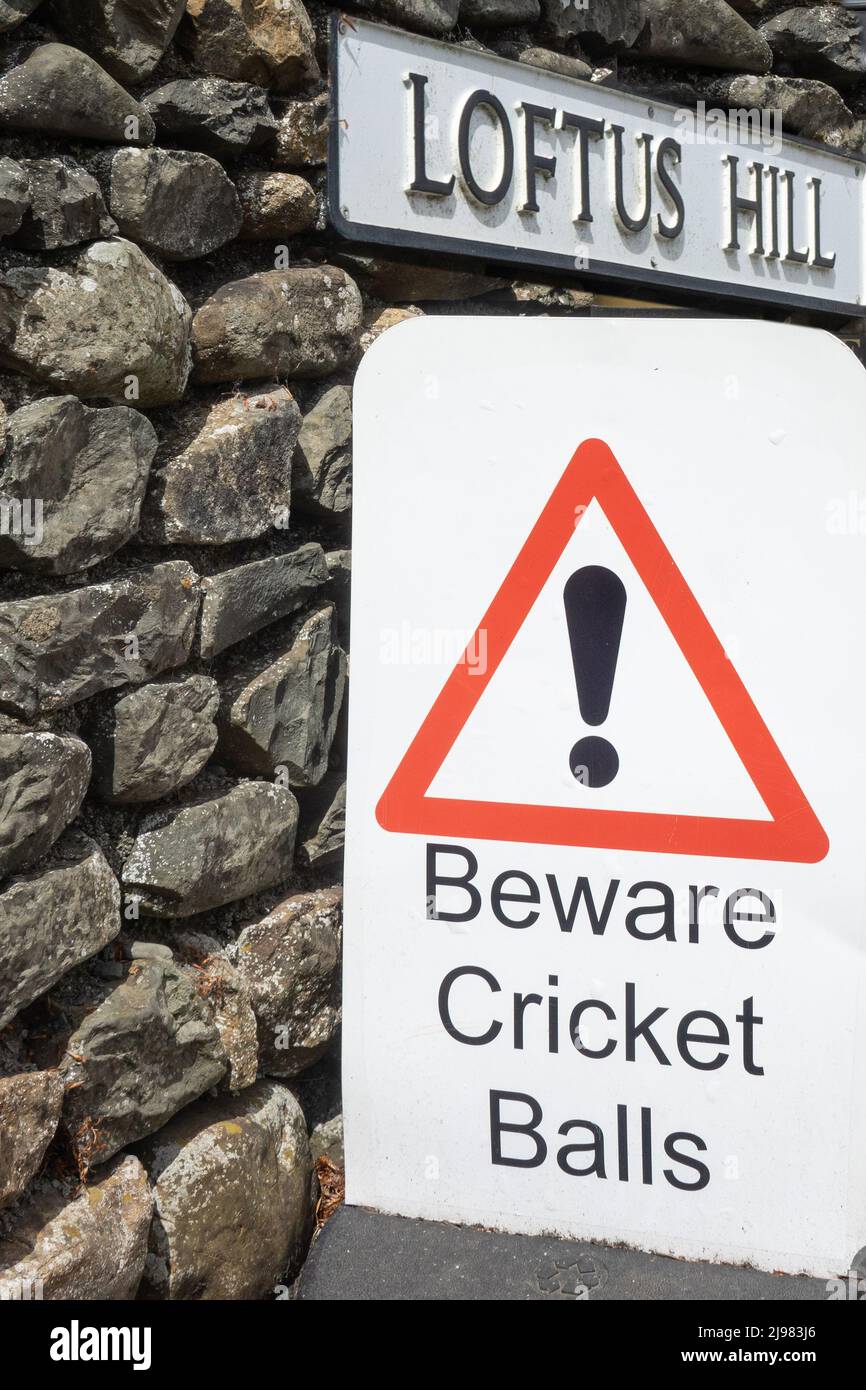 England, Cumbria, Sedbergh, 'Beware Cricket balls!' sign Stock Photo