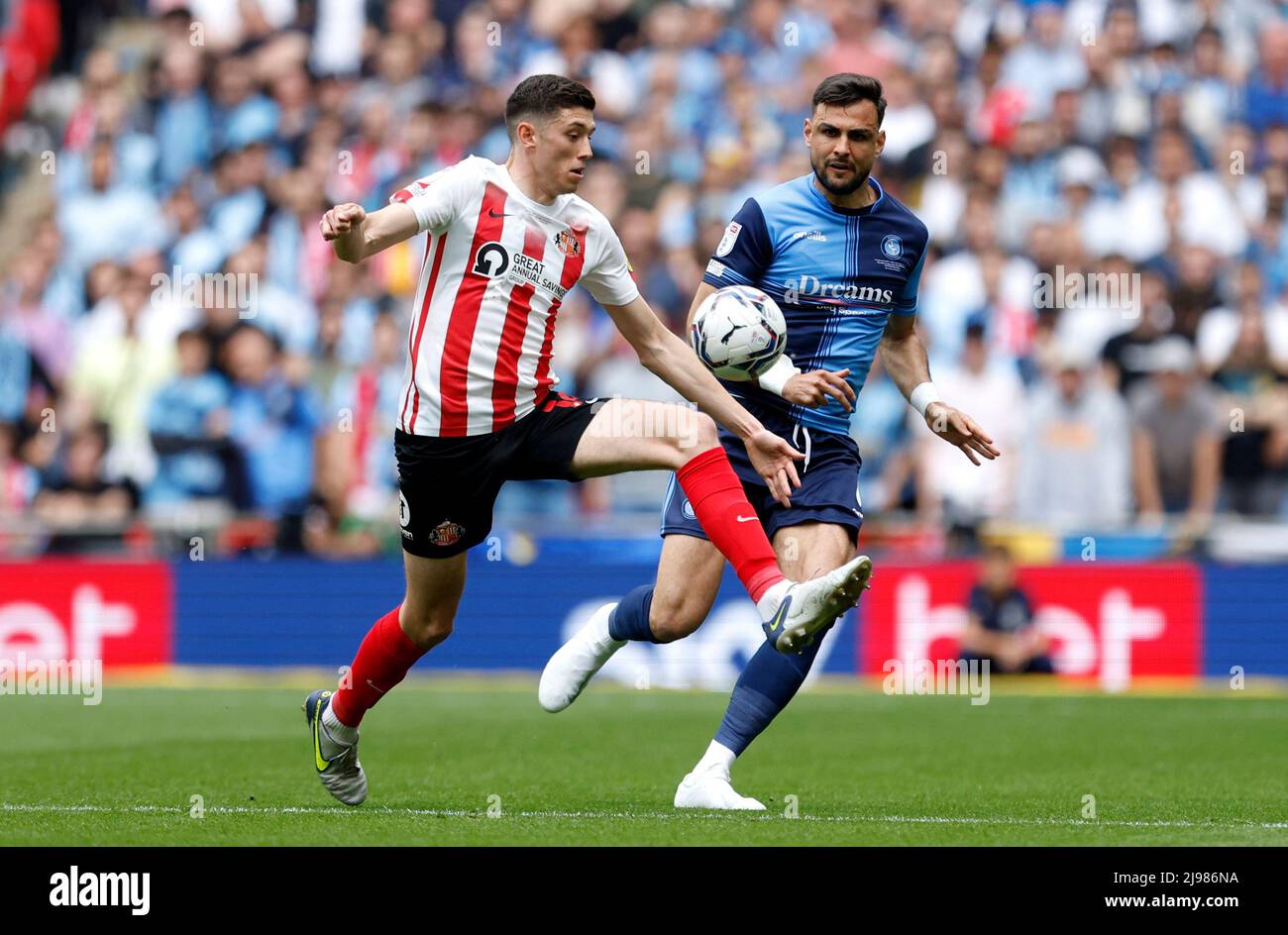 Sunderland's Lynden Gooch (left) and Wycombe Wanderers' Ryan Tafazolli battle for the ball during the Sky Bet League One play-off final at Wembley Stadium, London. Picture date: Saturday May 21, 2022. Stock Photo