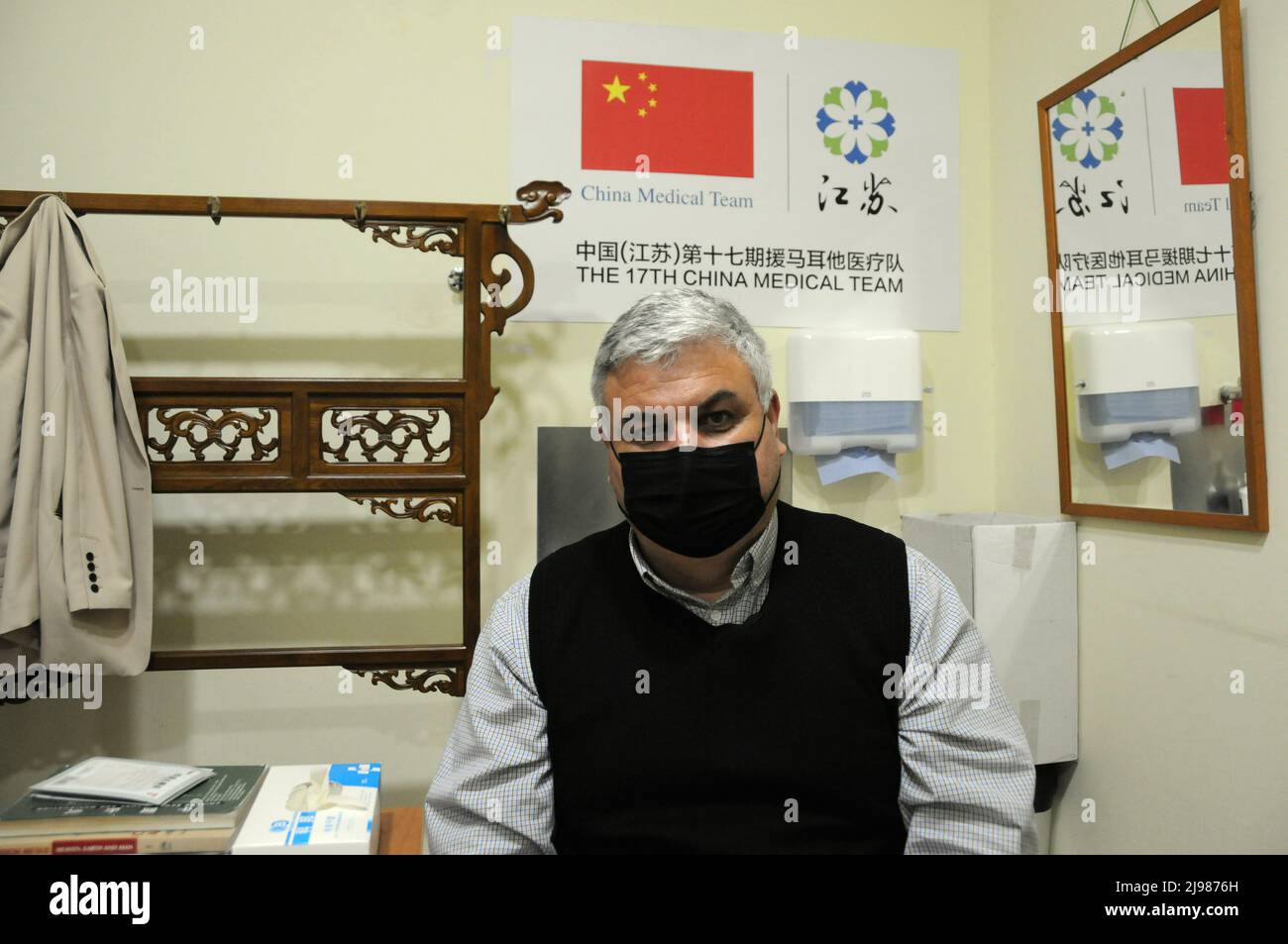 Paola, Malta. 28th Apr, 2022. Daniel Bugeja, a patient receiving Traditional Chinese Medicine (TCM) treatment, is seen during an interview with Xinhua in Paola, Malta, April 28, 2022. TO GO WITH 'Feature: Traditional Chinese medicine cures Maltese patient of sciatica' Credit: Chen Wenxian/Xinhua/Alamy Live News Stock Photo