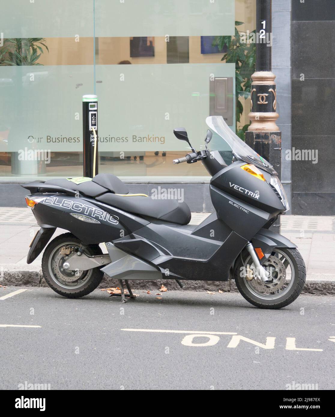 Electric scooter at charging bay station, London, UK Stock Photo Alamy