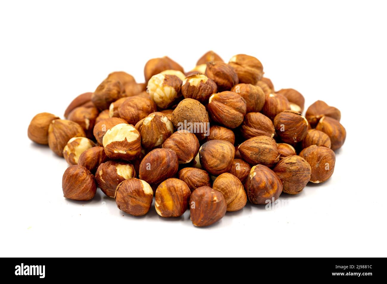 Hazelnut nuts isolated on white background. Organic nuts. close up