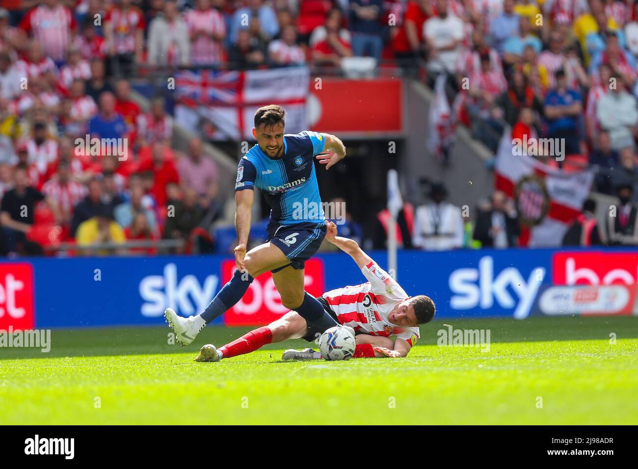 Wembley Stadium, London, UK. 21st May, 2022. FA League 1 promotion play-off final, Sunderland versus Wycombe Wanderers; Ryan Tafazolli of Wycombe Wanderers is tackled. Credit: Action Plus Sports/Alamy Live News Stock Photo