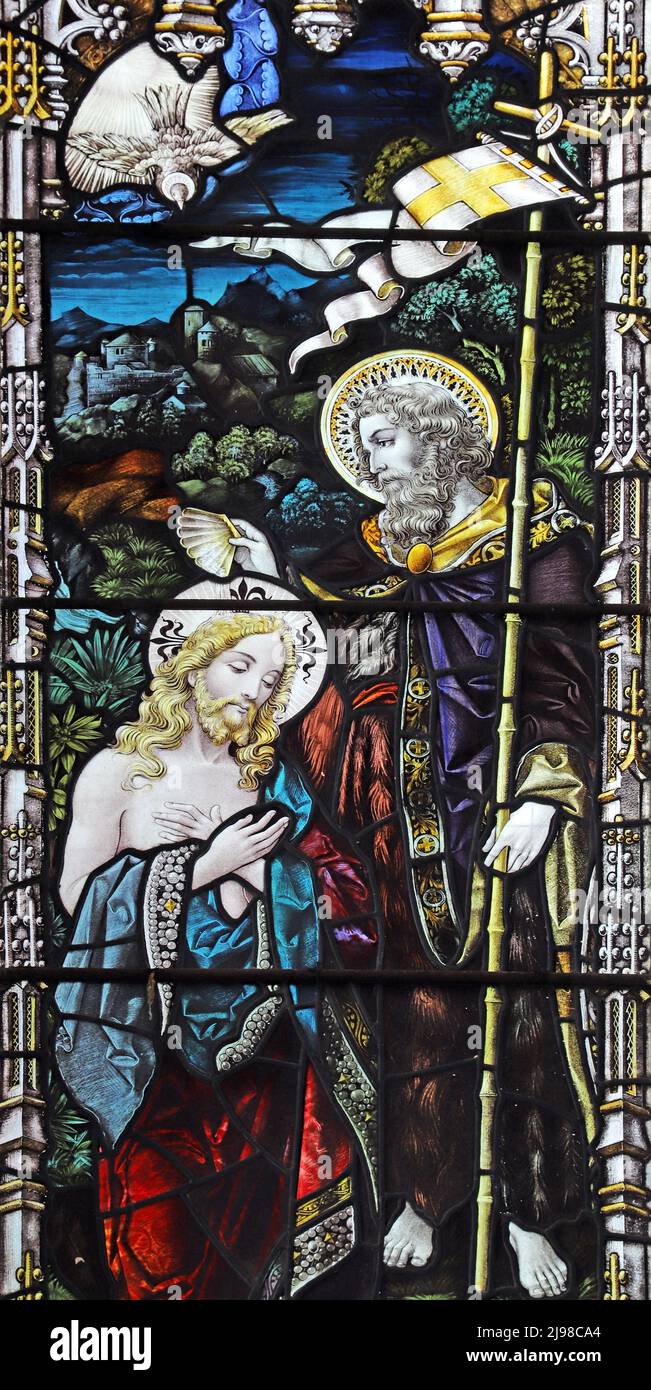 A stained glass window by Percy Bacon & Brothers depicting the baptism of Christ, Maids Moreton Church, Buckinghamshire Stock Photo