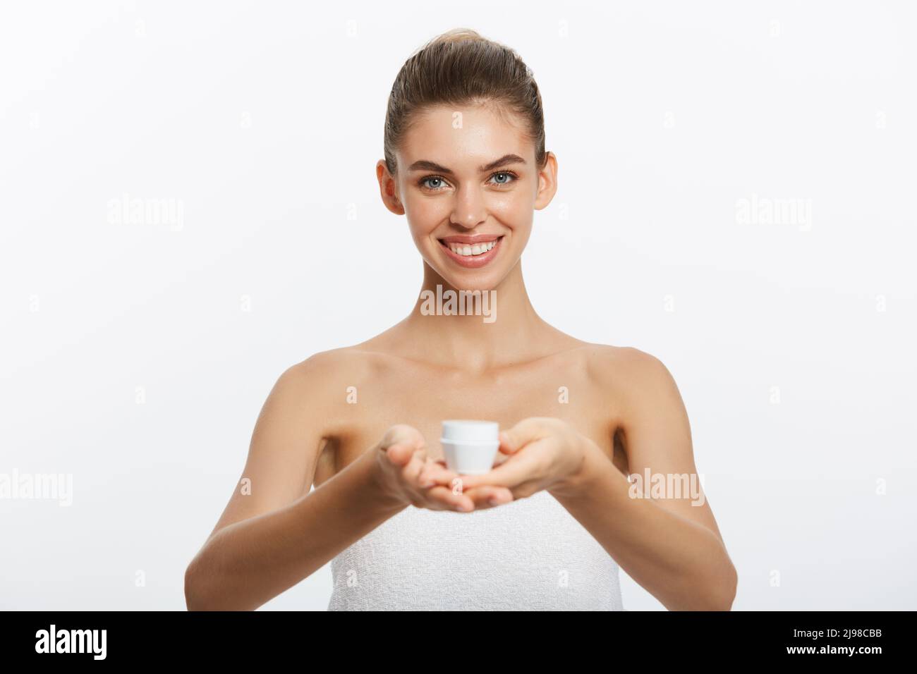 Beautiful Young Woman with Clean Fresh Skin look away. Girl beauty face ...