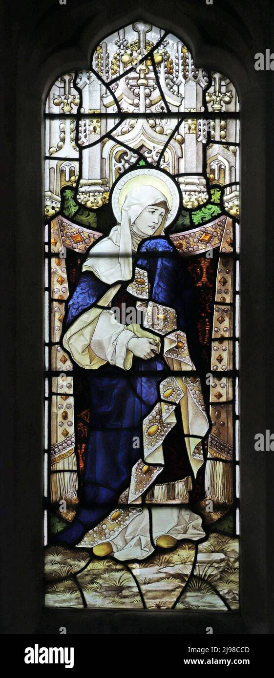 Stained glass window by Percy Bacon & Brothers depicting the Blessed Virgin at the crucifixion, St Peter & St Paul?s Church, Wingrave, Buckinghamshire Stock Photo